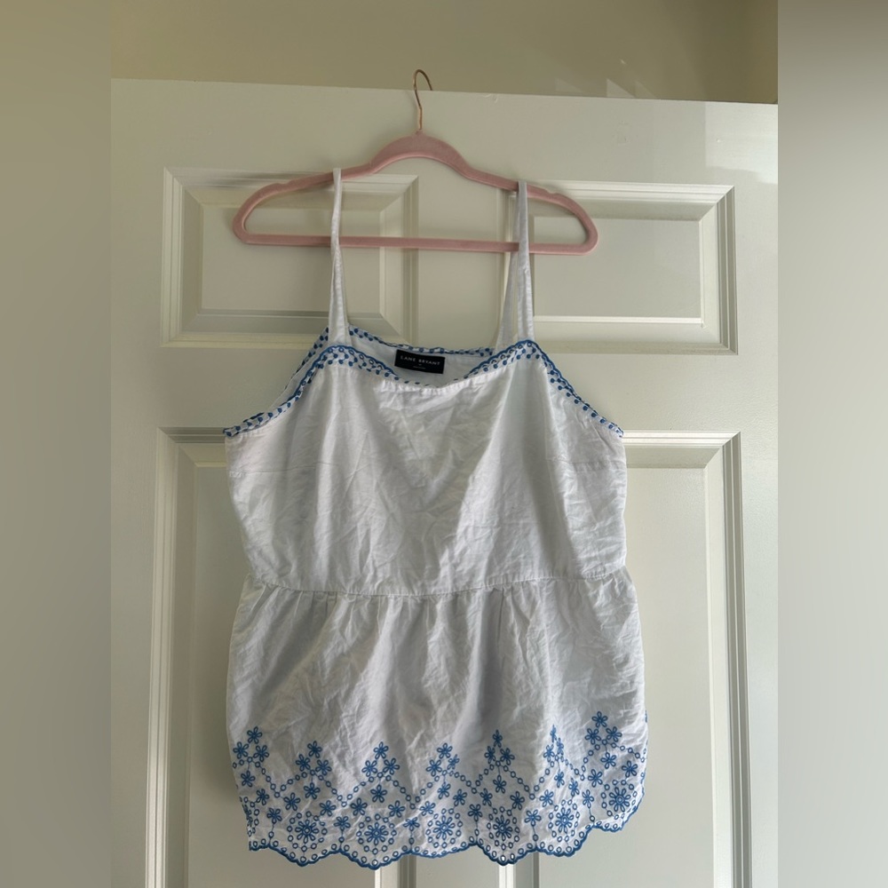 Size: 18 White Peplum blouse with blue design